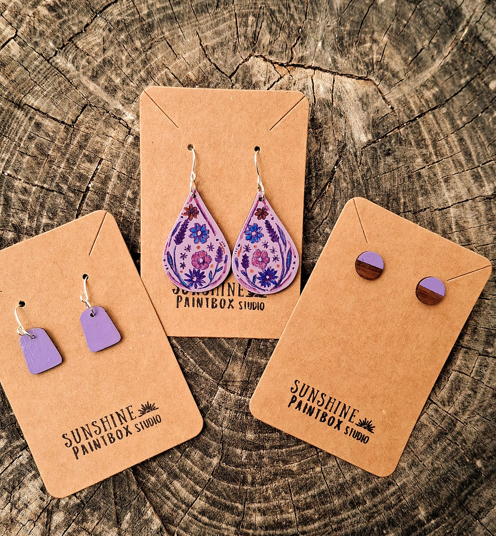 Variety of purple earrings