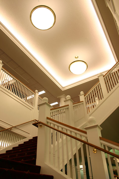 Grand staircase at Plymouth District Library with colonial design elements