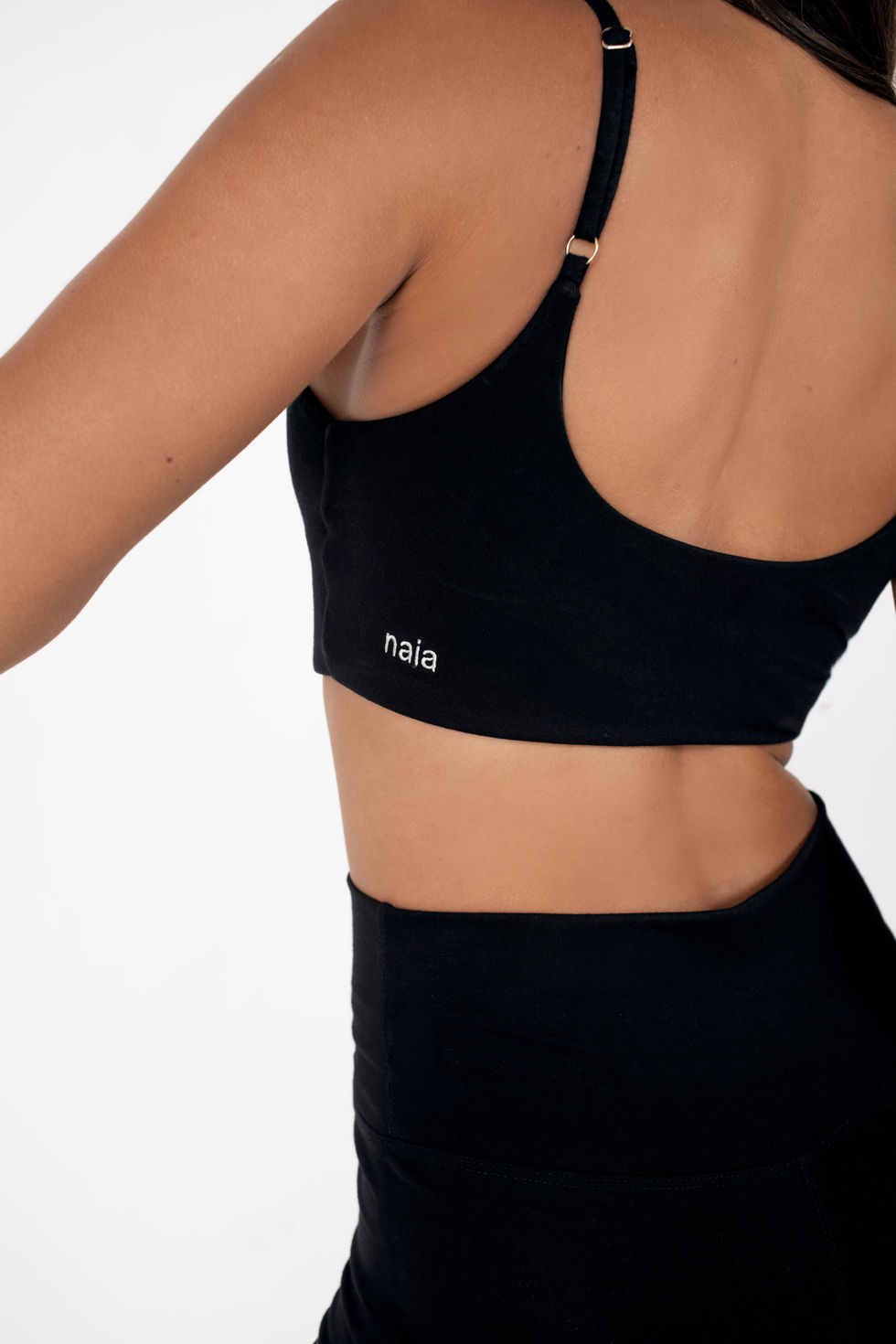 Model wearing lounge and activewear in a e commerce studio shoot for a sustainable activewear brand from Germany