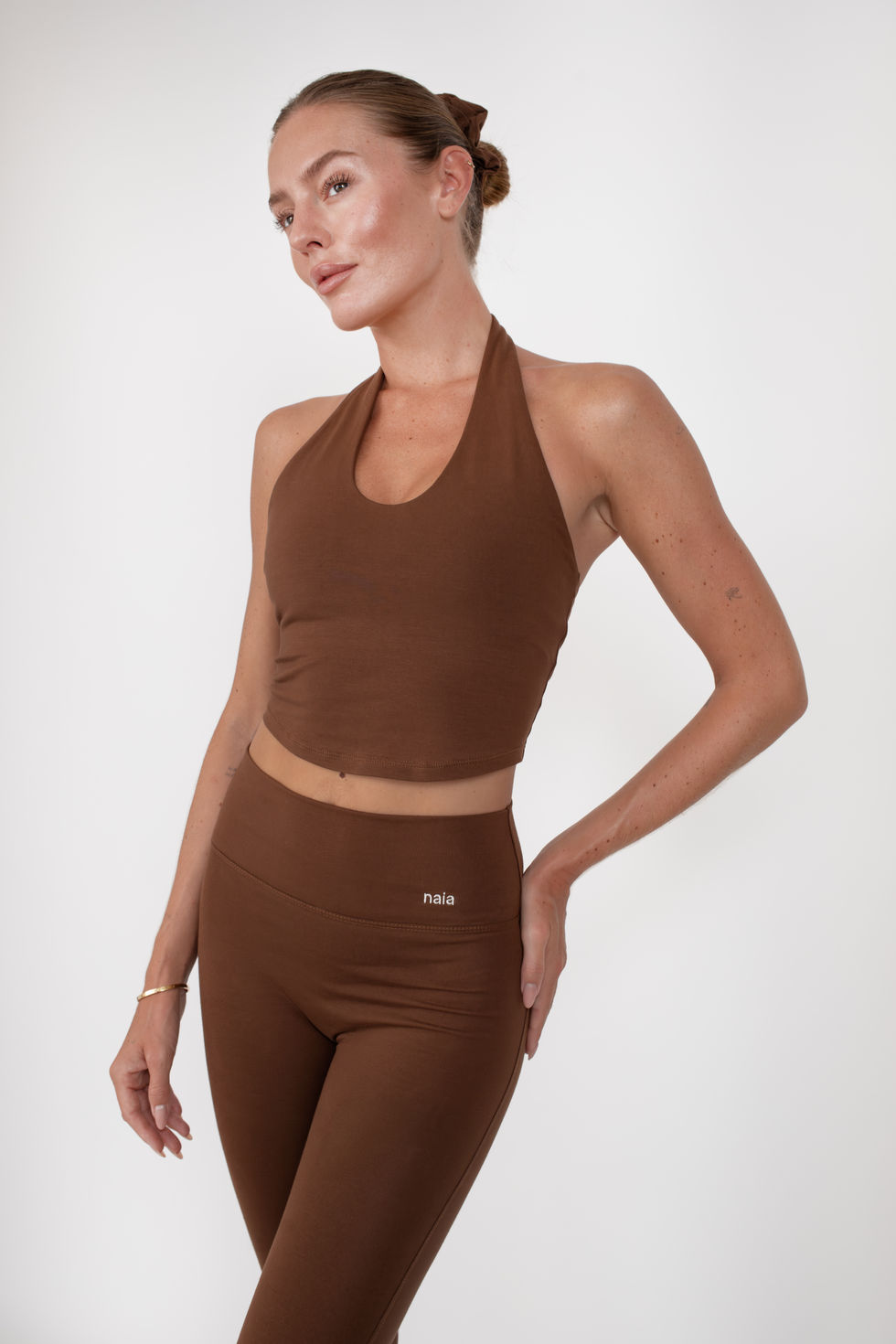 Model wearing lounge and activewear in a e commerce studio shoot for a sustainable activewear brand from Germany