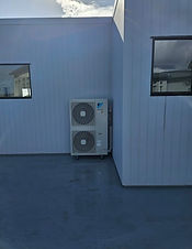 Second story floor mounted Daikin outdoor unit