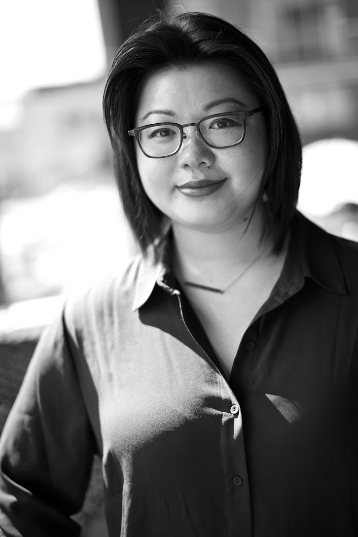 Mindy Eng Smiling in glasses