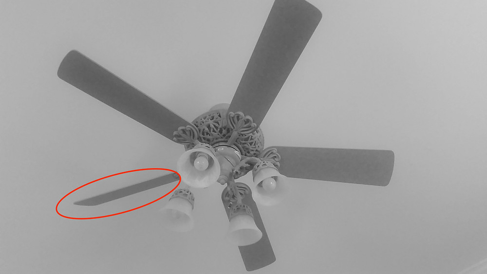 Actual master bedroom ceiling fan and the crooked blade.