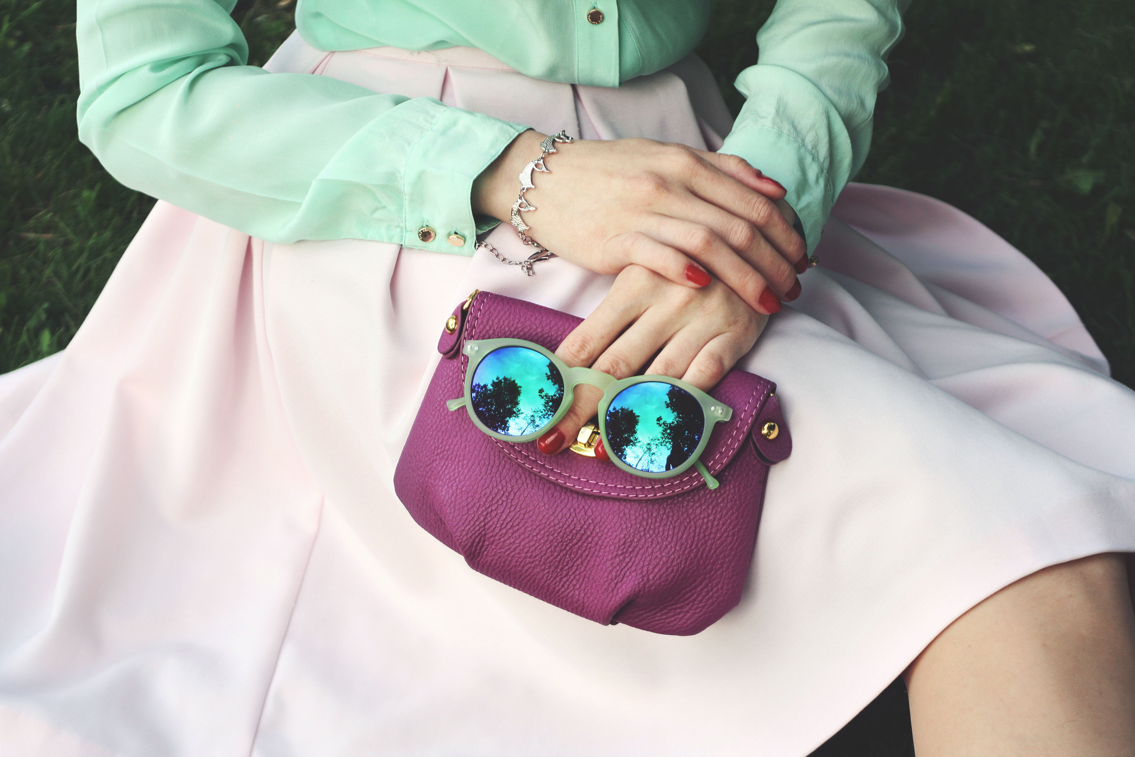 purple bag and sunglasses
