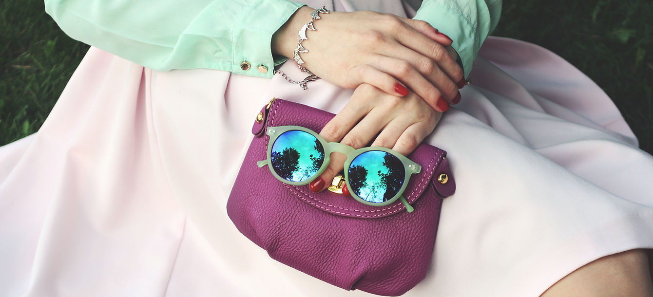 purple bag and sunglasses