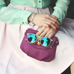 purple bag and sunglasses