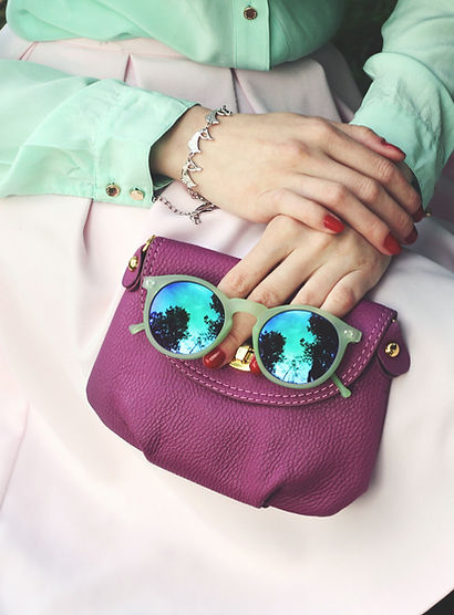 purple bag and sunglasses