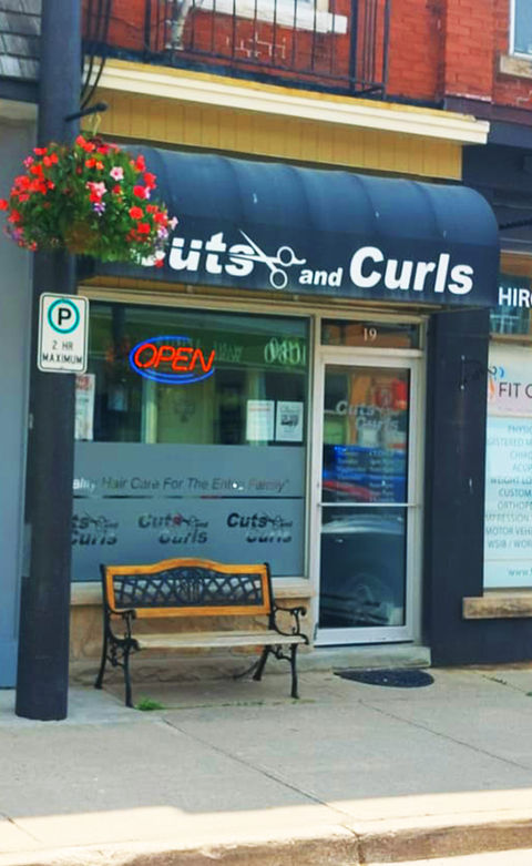 cuts and curls barbershop grand valley