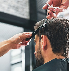 Man Getting a Haircut Barbershop Grand Valley