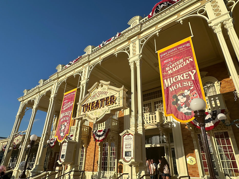 Town Square Theater meet and greet entrance at Magic Kingdom, with a classic marquee sign and elegant Victorian architecture, where guests can meet Mickey and Minnie.