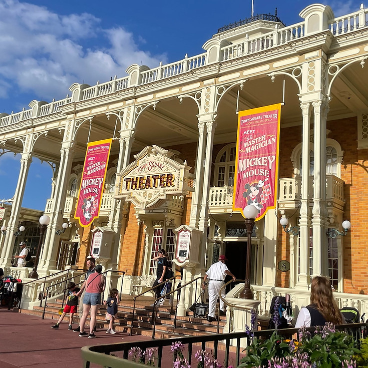 Town Square Theater meet and greet entrance at Magic Kingdom, with a classic marquee sign and elegant Victorian architecture, where guests can meet Mickey and Minnie.