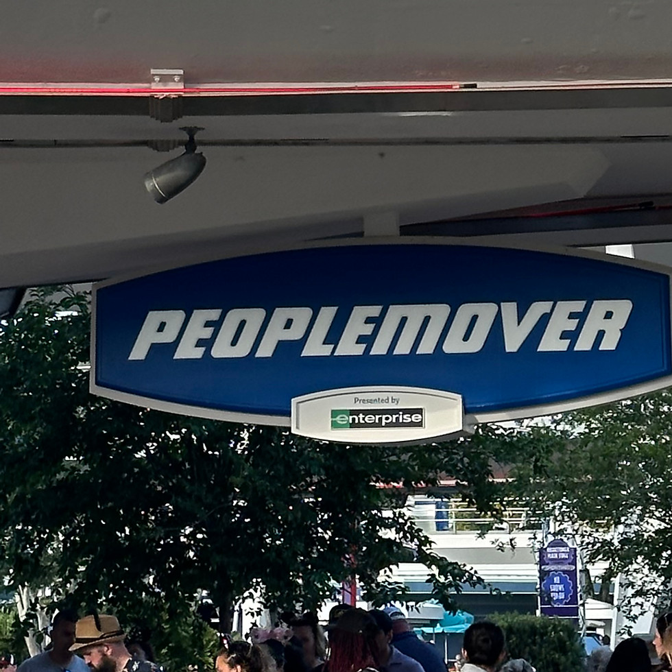 Tomorrowland’s futuristic blue and white sign.