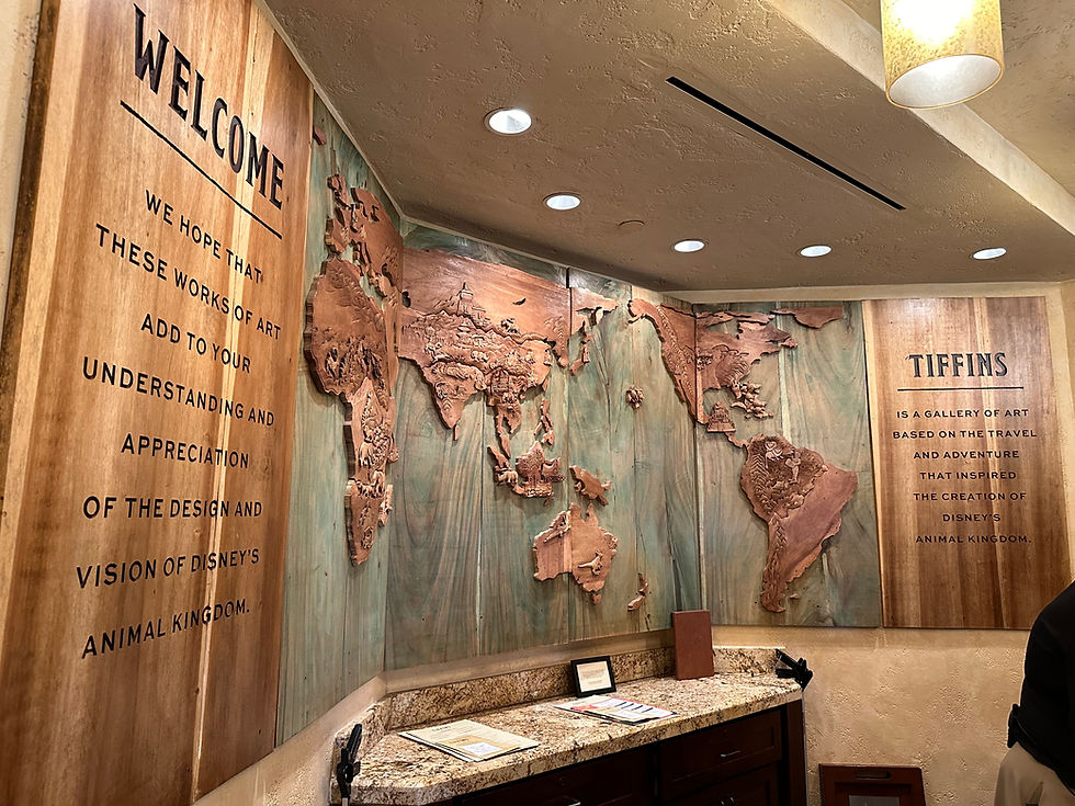 Tiffins Host Station with Wood Carving of the World