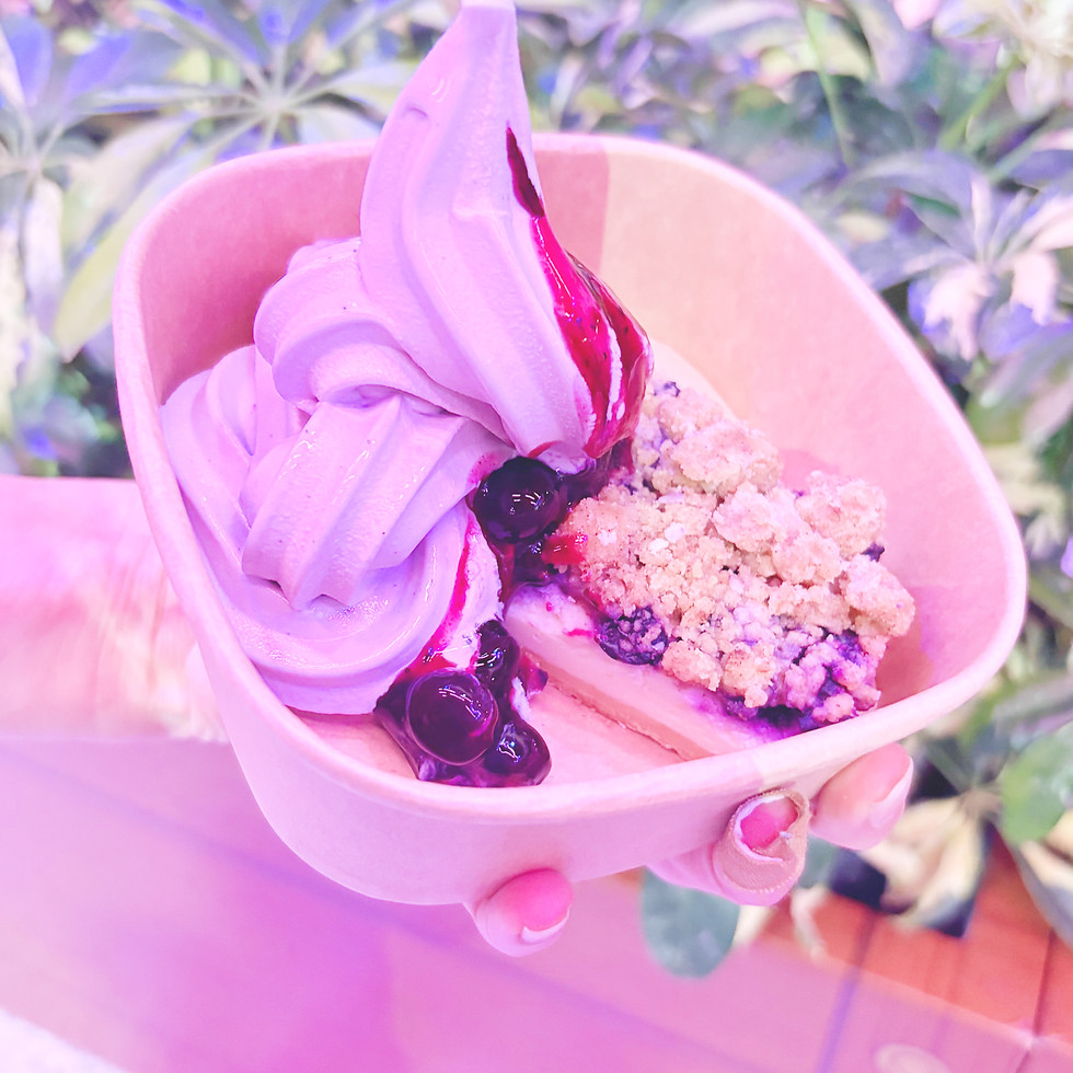 Blueberry Crumble Cake at EPCOT, moist crumble cake layered with blueberries and topped with blueberry soft serve and blueberry syrup.