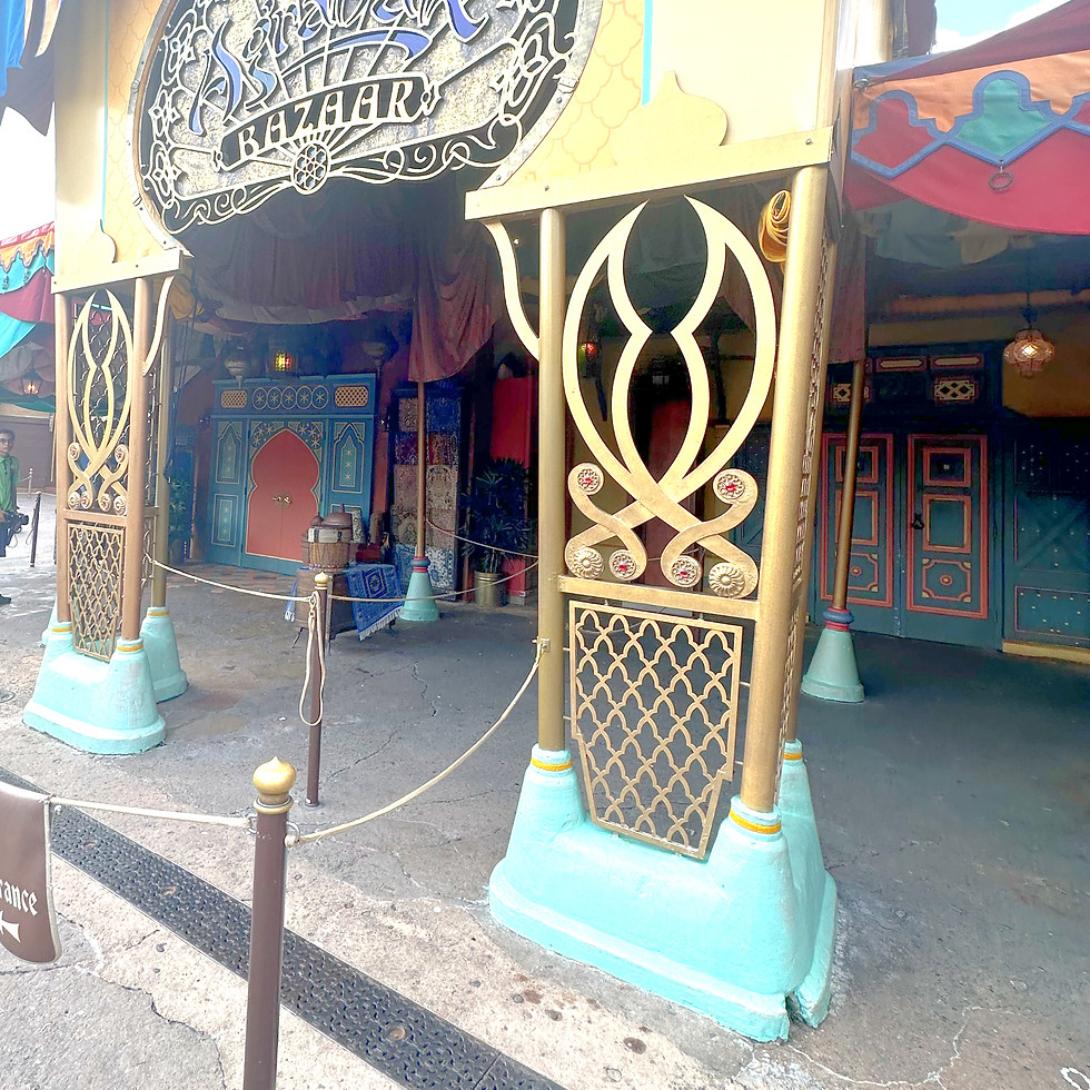 Princess Jasmine meet and greet at Magic Kingdom, set in an Agrabah-themed courtyard with desert-inspired architecture and colorful textiles framing the enchanting setting.