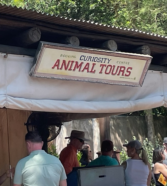 Curiosity Animal Tours Sign