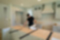 Josh Holmgren reviews plans in a Vancouver kitchen remodel project during construction