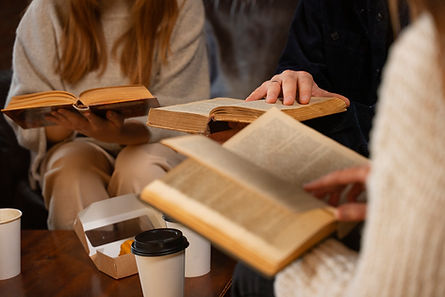 side-view-people-holding-books.jpg
