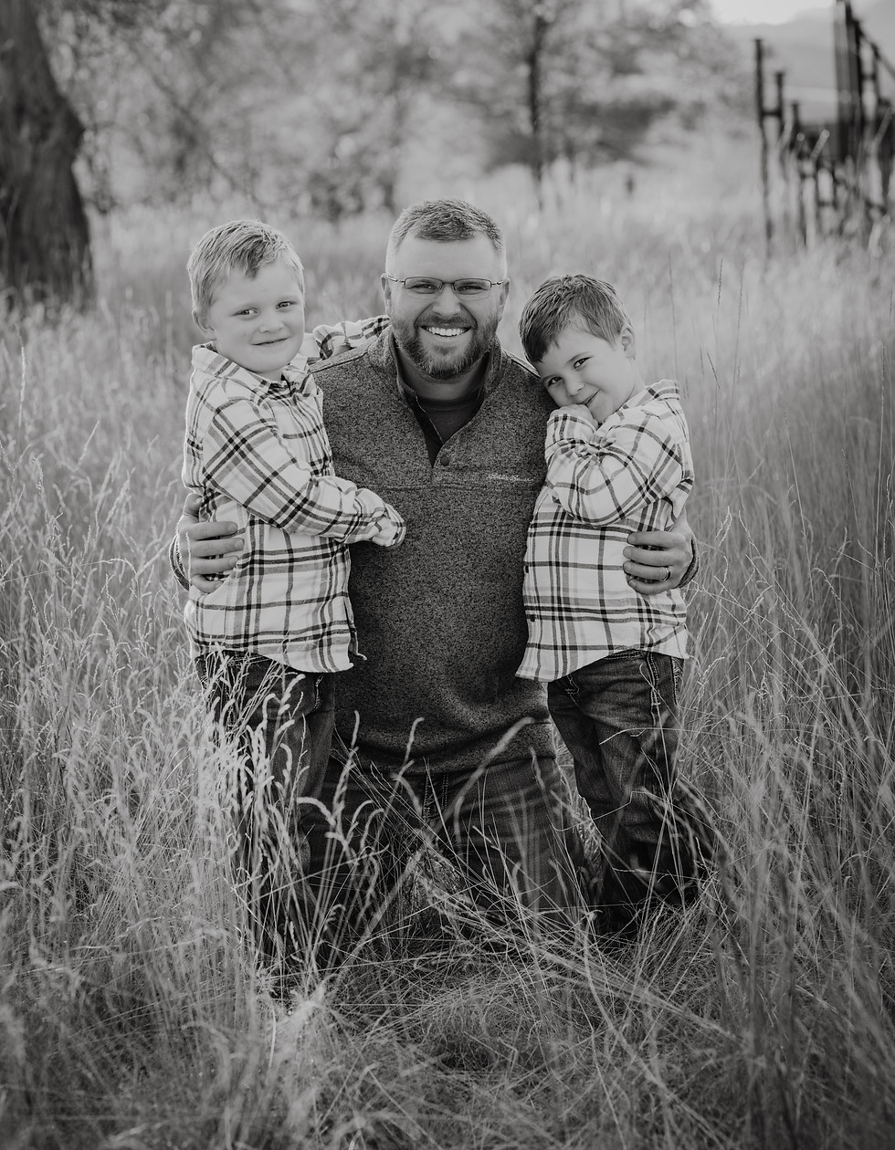 Photo of the 406 Web Design co-founder with 2 of his kids, a performance-focused web designer with 15 years tech experience, emphasizing custom, professional, responsive website design.