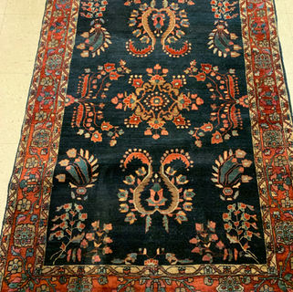 A beautiful Persian Sarouk, circa 1915, 3-4x5. This Navy field Sarouk has a floral pattern that is not busy like most Sarouks.