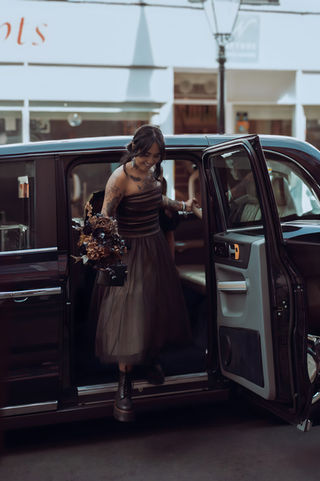 Bride arriving at Rye Town Hall greeted by her Sussex Wedding Photographer