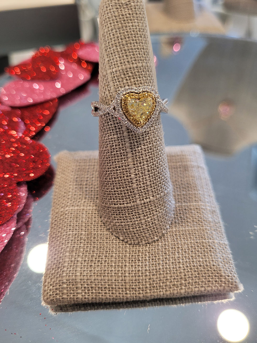 Thumbnail: Yellow heart shaped diamond ring