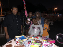 Councilmen Farias and one of his assigned families