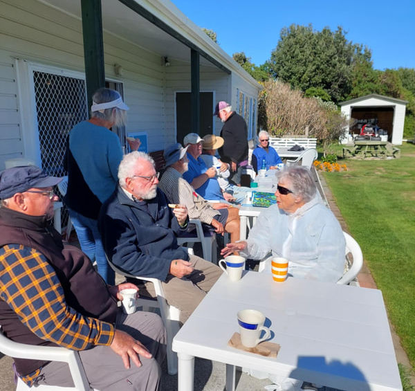 Seniors enjoying an outdoor social gathering