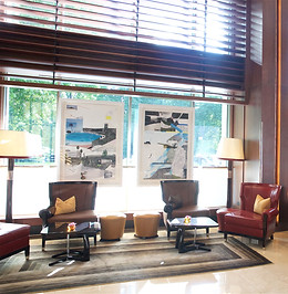 Bonnie and Clyde prints hanging in the window of a gallery.