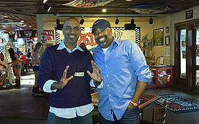 Sonu performing magic for Darius Ruckr of Hootie and the Blowfish