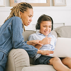 Child participating in online speech therapy