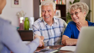 elder law attorney meeting with senior couple financial planning Texas