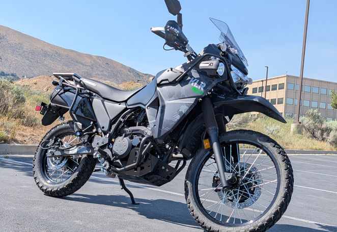 A large gray motorcycle, viewed from a low angle