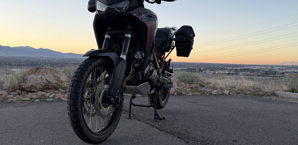 Front view of a motorcycle at dusk