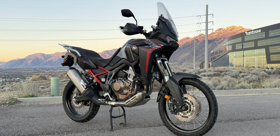 Side view of a motorcycle in front of a building