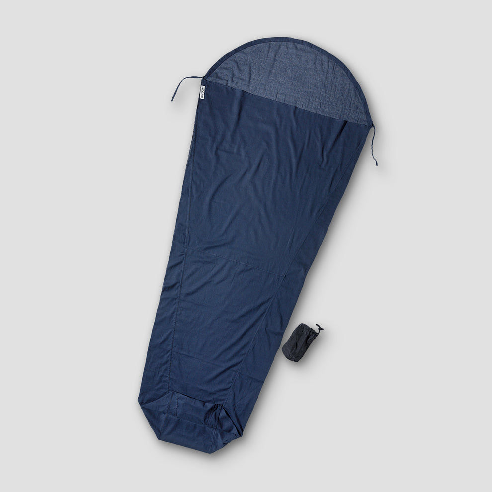 Mummy shaped sleeping bag liners in a variety of colors