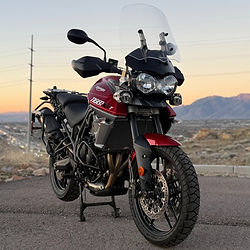 A very clean red motorcycle