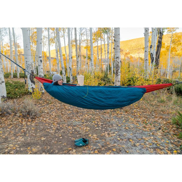 Thumbnail: A blue down hammock underquilt