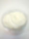 open jar of luxury whipped shea butter on a white background.