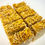 Thumbnail: ten bars of fresh marigold butter handmade soap topped with petals