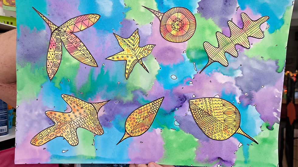 Eye-level view of a child painting a bright orange pumpkin on canvas