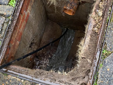 High pressure water jetting clearing and cleaning sewer drain 