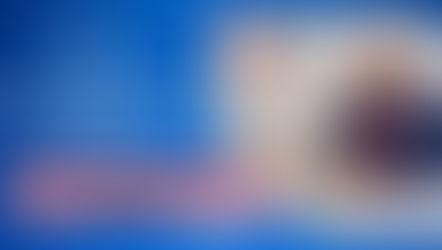 Smiling man in business attire at laptop. Text: TurboTax Exclusive Member Webinar, Jan 7, 4PM MT. Blue and pink background.