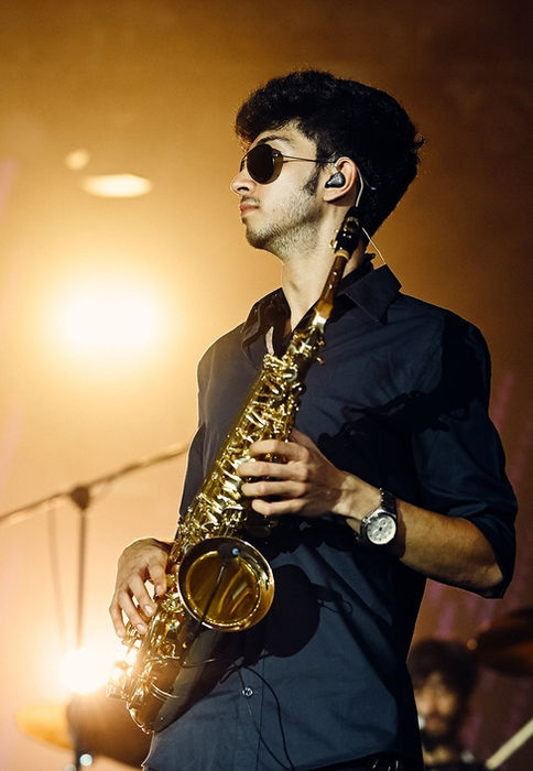 Pranay Gulvady of the Perfect Strangers performing live on stage