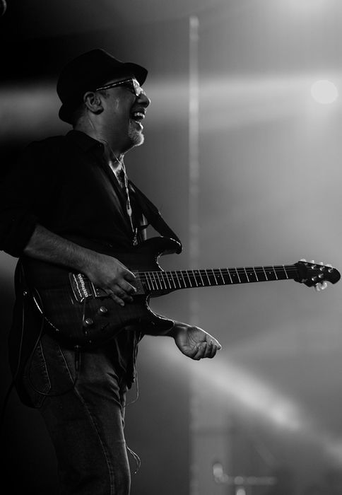 Debjeet Basu of Perfect Strangers India playing the electric guitar on stage