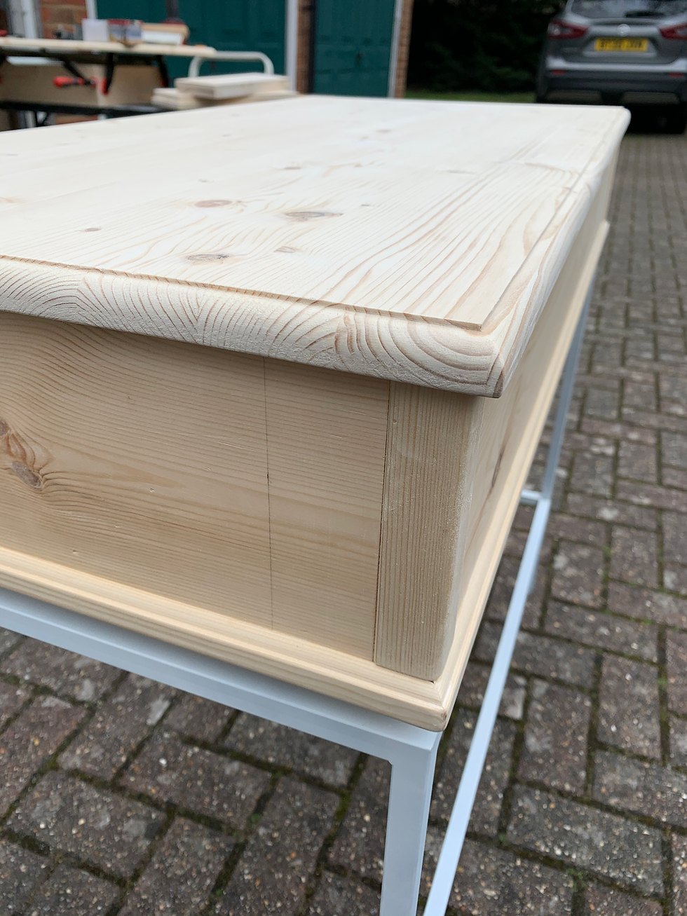 Unfinished wooden dressing table top with visible grain