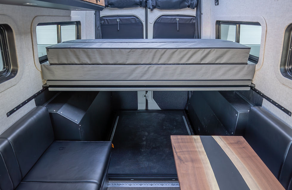 Davey Jackson 170 Offroad Camper Van Cafe Seating Area with Lagun Table by Off Highway Van
