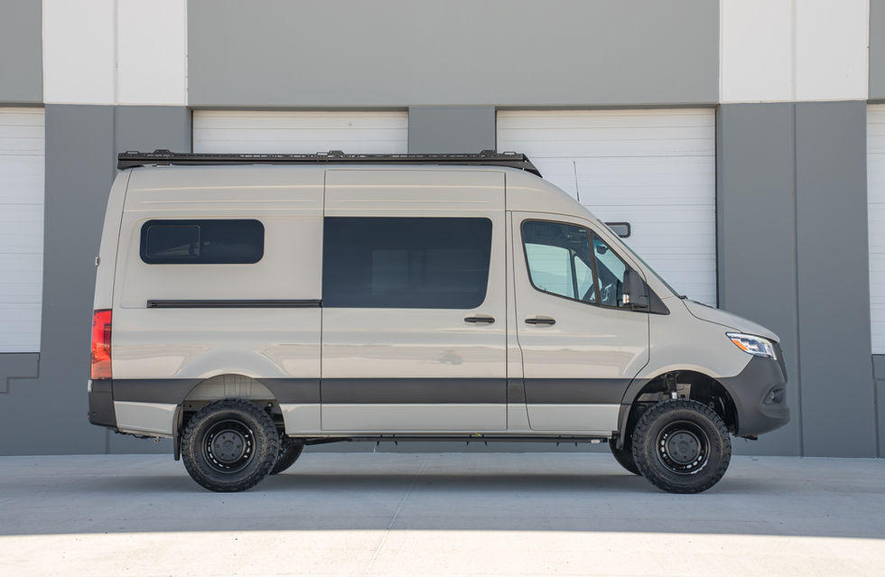 30" BF Goodrich K03 Tires on Dark Star Offroad HALO Roof Rack + Lightbar on Sundance Kid 144 Basecamp Off Grid Offroad Adventure Camper Van by Off Highway Van 