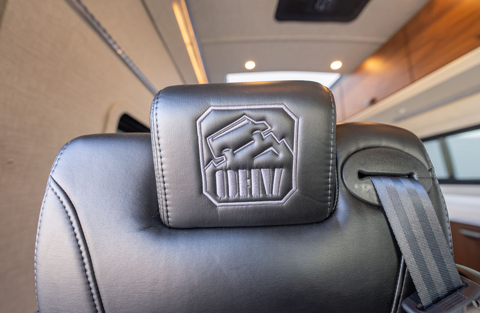 Custom Captain's Chair Detail In A 2025 Doc Holliday 170 Pro-X Off-Grid Camper Van Interior by Off Highway Van 