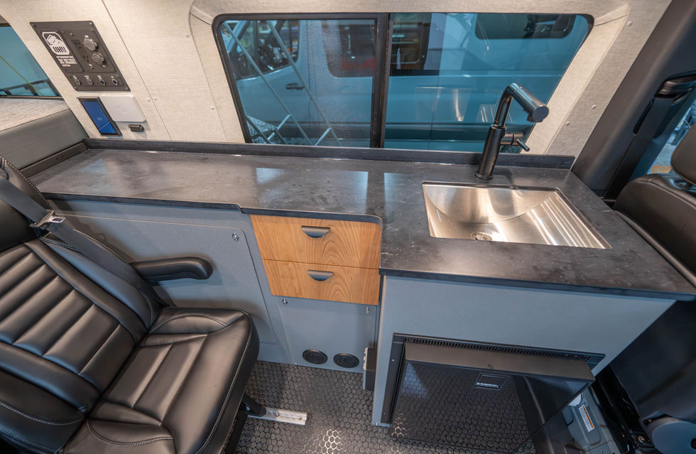 Galley Kitchen in a Doc Holliday 144 Pro-X Off-Grid Camper Van by Off Highway Van